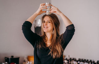 Small business owner Danna Lusk crafting wildland fire inspired candles